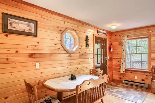 The dining room and front door.